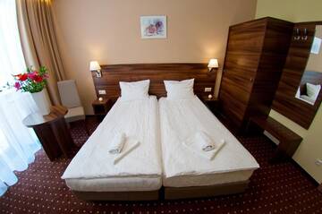 Фото номера Двухместный номер с 2 отдельными кроватями Отель Hotel Podium г. Висла 6