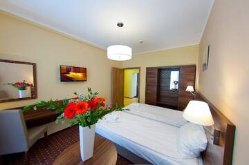 Фото номера Трехместный номер с балконом Отель Hotel Podium г. Висла 3