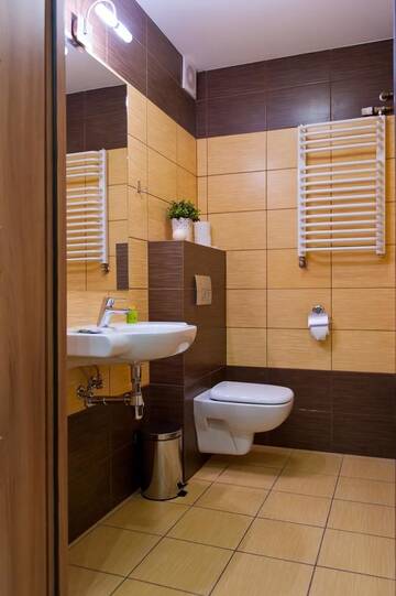 Фото номера Трехместный номер с балконом Отель Hotel Podium г. Висла 4