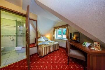 Фото номера Двухместный номер с 1 кроватью или 2 отдельными кроватями Отель Hotel Pod Gołębiem г. Висла 5
