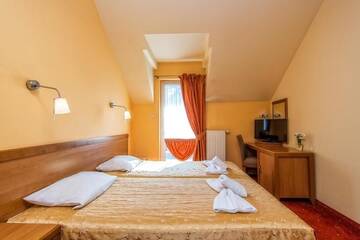 Фото номера Двухместный номер с 1 кроватью или 2 отдельными кроватями Отель Hotel Pod Gołębiem г. Висла 11