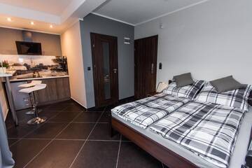 Фото номера Люкс с террасой Апартаменты Apartamenty Dawna Wisła г. Висла 13
