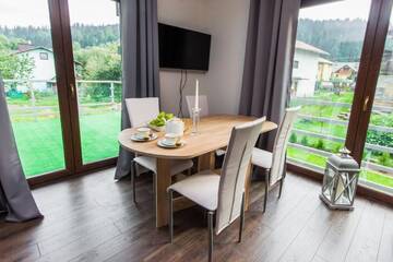 Фото номера Апартаменты с 1 спальней и балконом Апартаменты Apartamenty Dawna Wisła г. Висла 7