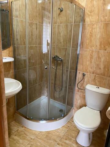 Фото номера Трехместный номер с ванной комнатой Проживание в семье Pokoje i apartamenty Aga Centrum г. Висла 4