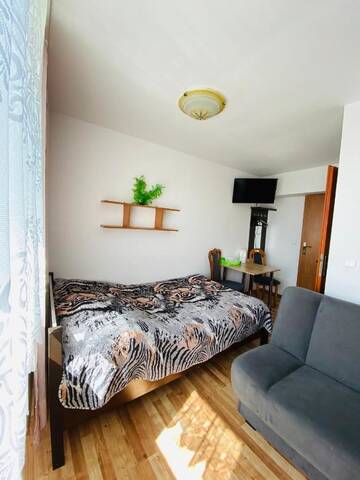 Фото номера Четырехместный номер с ванной комнатой Проживание в семье Pokoje i apartamenty Aga Centrum г. Висла 3