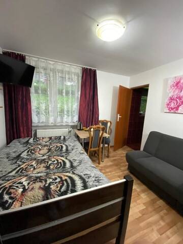 Фото номера Трехместный номер с ванной Проживание в семье Pokoje i apartamenty Aga Centrum г. Висла 5
