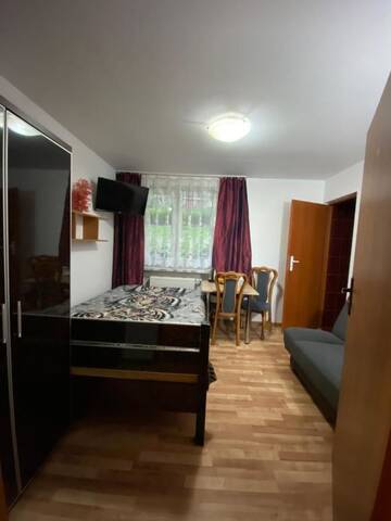 Фото номера Трехместный номер с ванной Проживание в семье Pokoje i apartamenty Aga Centrum г. Висла 6
