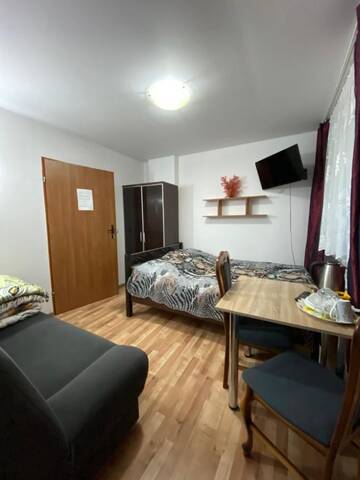 Фото номера Трехместный номер с ванной Проживание в семье Pokoje i apartamenty Aga Centrum г. Висла 4