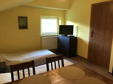 Фото номера Четырехместный номер с видом на горы Апартаменты Apartamenty Nova Dolina г. Висла 4