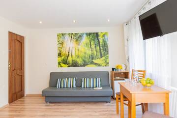 Фото номера Стандартный трехместный номер Проживание в семье Apartament i Pokoje Gościnne u Lusi - POKOJE OZONOWANE!!! г. Висла 5
