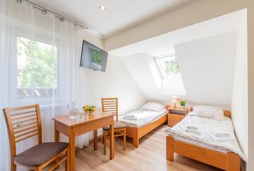 Фото номера Стандартный трехместный номер Проживание в семье Apartament i Pokoje Gościnne u Lusi - POKOJE OZONOWANE!!! г. Висла 3