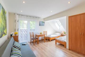Фото номера Стандартный трехместный номер Проживание в семье Apartament i Pokoje Gościnne u Lusi - POKOJE OZONOWANE!!! г. Висла 4