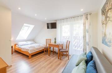 Фото номера Стандартный трехместный номер Проживание в семье Apartament i Pokoje Gościnne u Lusi - POKOJE OZONOWANE!!! г. Висла 7