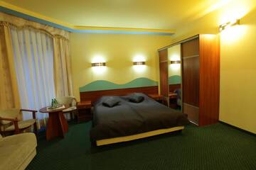 Фото номера Двухместный номер с 1 кроватью и джакузи Отель Hotel Arka Spa г. Висла 4