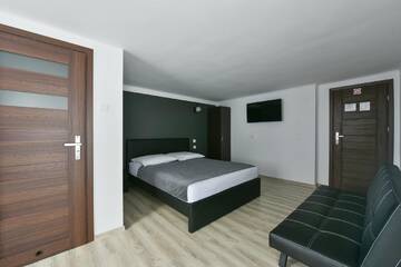 Фото номера Семейный номер с террасой Отели типа «постель и завтрак» Villa Platinum г. Висла 5